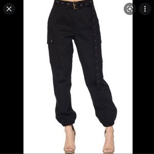 Black Cargo Pants with belt buckle. Size Large